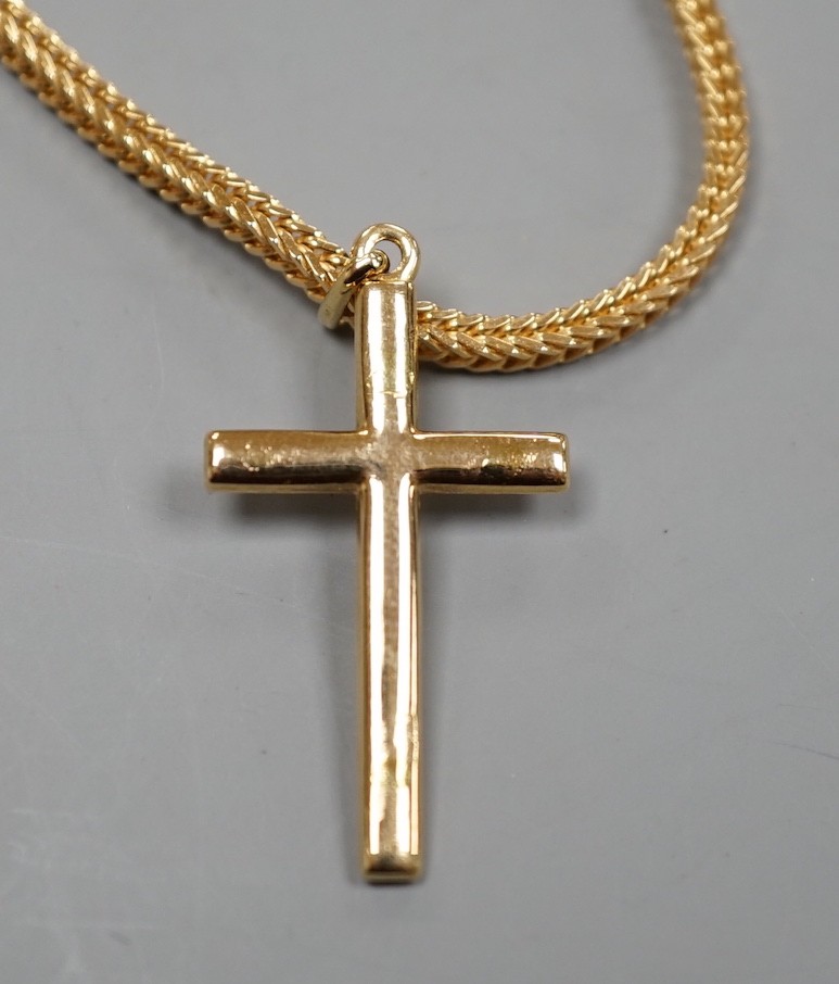 A modern Italian 750 yellow metal cross pendant, 32mm, on an Italian 750 chain, 66cm, 27.4 grams.